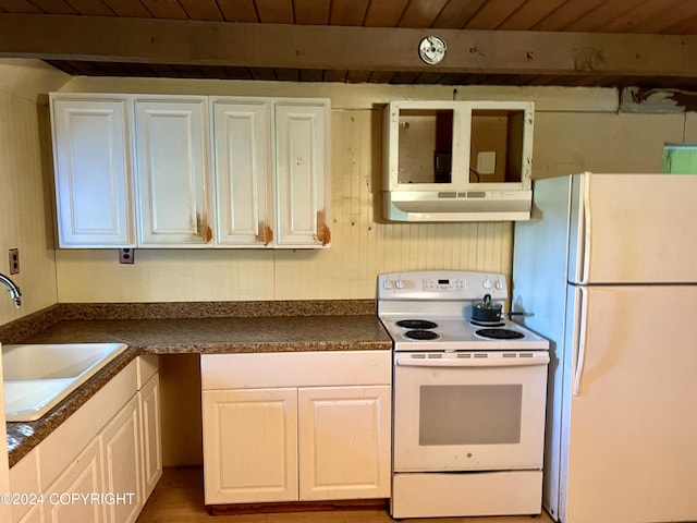 kitchen with beamed ceiling, white appliances, sink, wood ceiling, and white cabinets