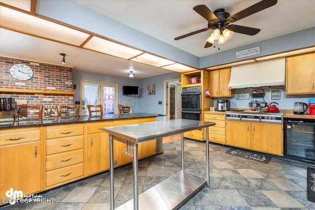 kitchen with wine cooler, stainless steel gas cooktop, exhaust hood, ceiling fan, and double oven