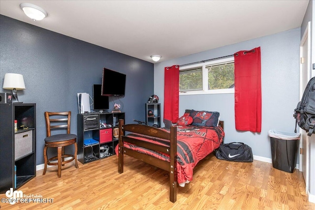 bedroom featuring light hardwood / wood-style flooring