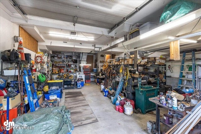 garage featuring a workshop area