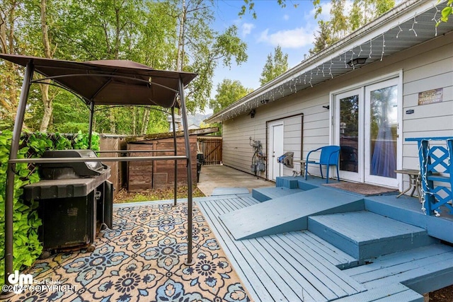 wooden deck featuring a patio