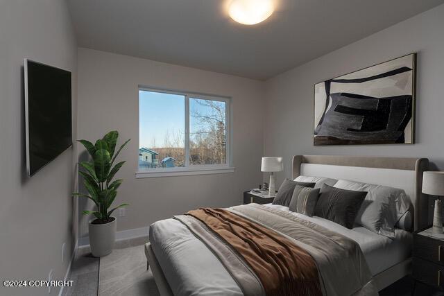 bedroom featuring carpet floors and baseboards