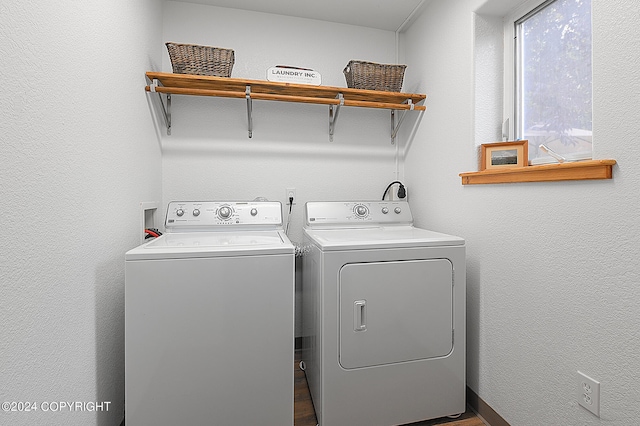 washroom with independent washer and dryer