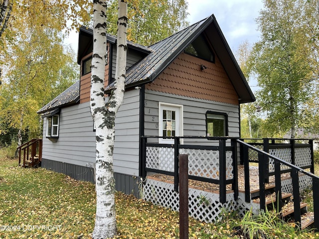 exterior space featuring a deck