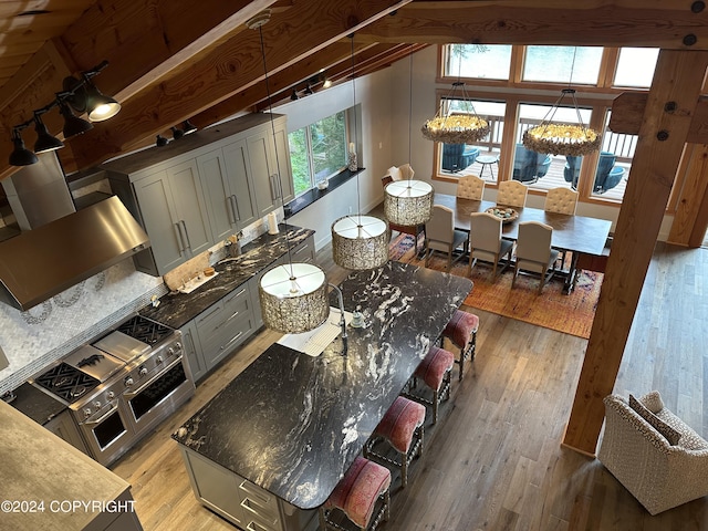 345 C St, Seldovia, AK 99663 - interior space with plenty of natural light, light wood-style flooring, and an inviting chandelier