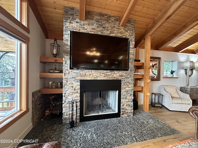 345 C St, Seldovia, AK 99663 - living room featuring baseboards, wood ceiling, vaulted ceiling with beams, a fireplace, and wood finished floors