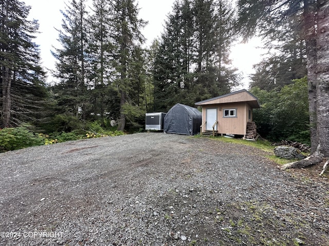 345 C St, Seldovia, AK 99663 - exterior space with a shed and an outdoor structure