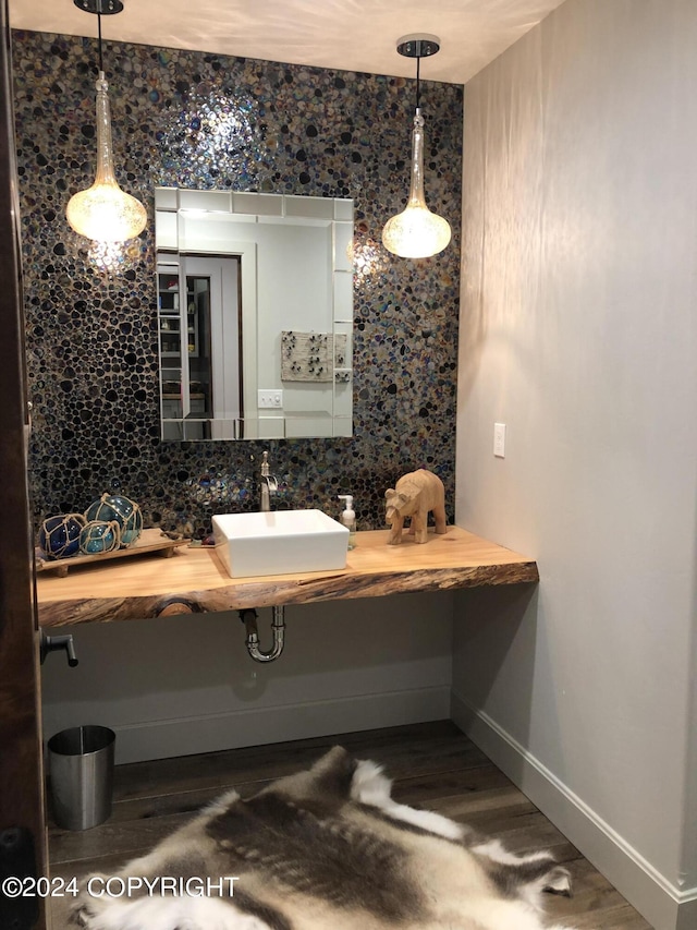 345 C St, Seldovia, AK 99663 - bathroom with a sink, tasteful backsplash, and baseboards