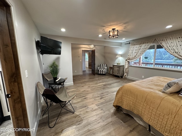 345 C St, Seldovia, AK 99663 - bedroom with light wood finished floors, baseboards, and recessed lighting