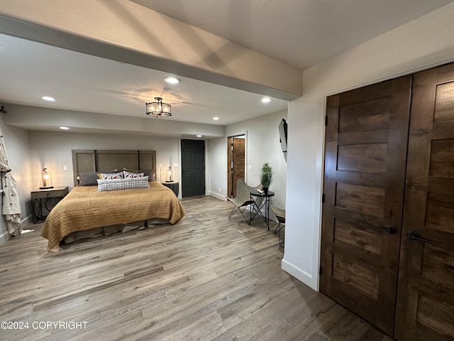 345 C St, Seldovia, AK 99663 - bedroom featuring baseboards, wood finished floors, and recessed lighting