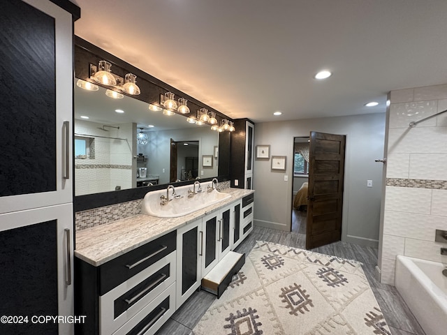 345 C St, Seldovia, AK 99663 - full bathroom with ensuite bathroom, a tile shower, recessed lighting, vanity, and a tub to relax in