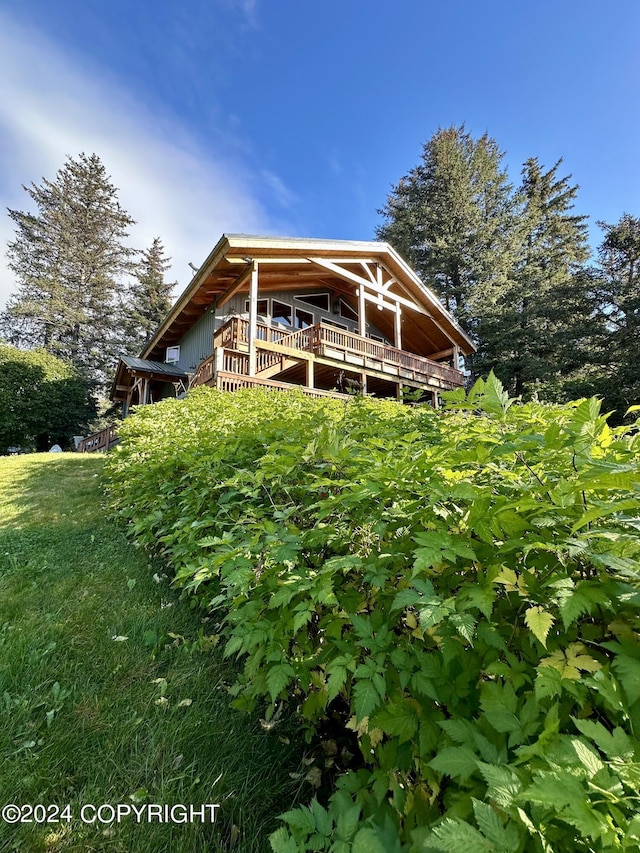 345 C St, Seldovia, AK 99663 - rear view of house featuring a wooden deck