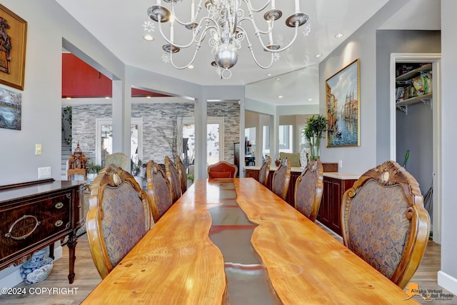8100 Sky Mountain Ln, Anchorage, AK 99502 - dining room featuring a chandelier, wood finished floors, and recessed lighting
