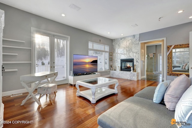 8100 Sky Mountain Ln, Anchorage, AK 99502 - living room with wood finished floors, recessed lighting, and a fireplace