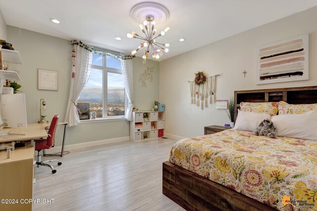 8100 Sky Mountain Ln, Anchorage, AK 99502 - bedroom with a chandelier, light wood-style floors, recessed lighting, a desk, and baseboards