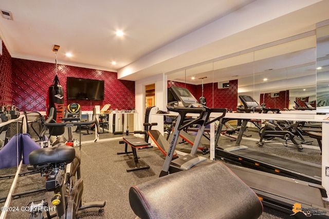 8100 Sky Mountain Ln, Anchorage, AK 99502 - gym featuring wallpapered walls and an accent wall