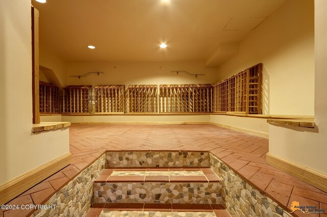 8100 Sky Mountain Ln, Anchorage, AK 99502 - wine room featuring recessed lighting and baseboards