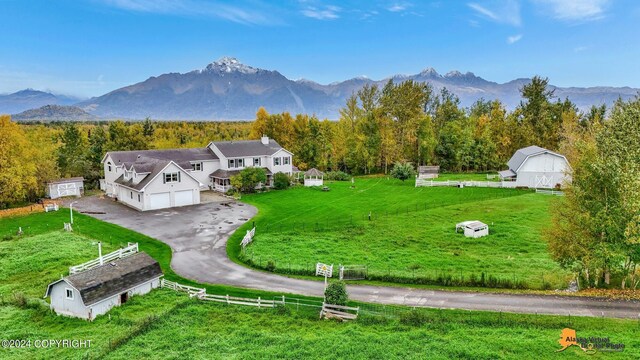 exterior space featuring a mountain view and a rural view