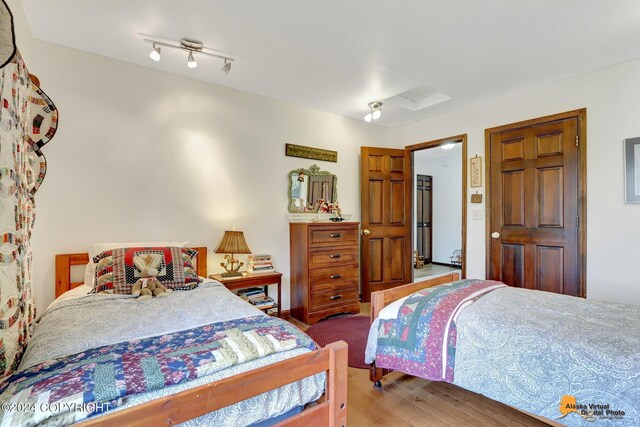 bedroom featuring hardwood / wood-style floors
