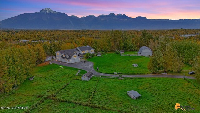 aerial view at dusk with a mountain view