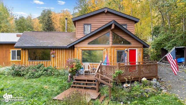 view of front facade featuring a wooden deck