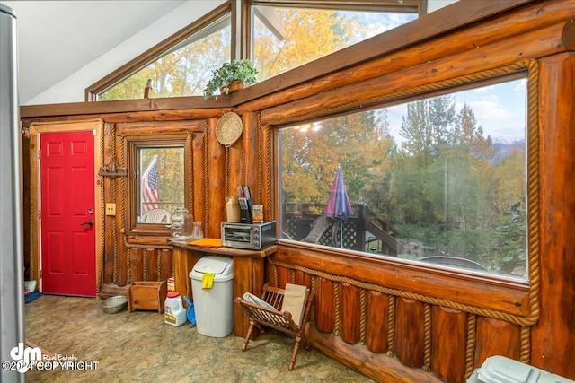 interior space featuring vaulted ceiling