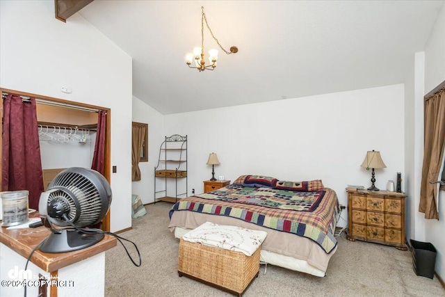 carpeted bedroom featuring vaulted ceiling with beams, a closet, and a chandelier