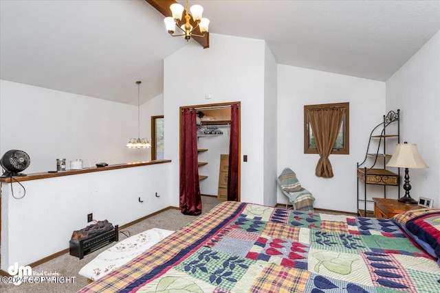 bedroom with an inviting chandelier, lofted ceiling, a closet, and light carpet