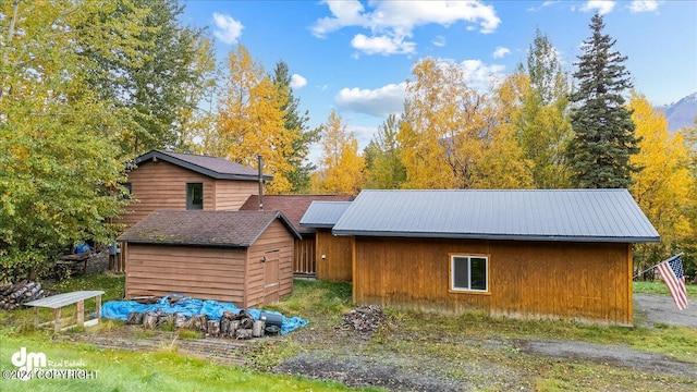 exterior space featuring a storage shed