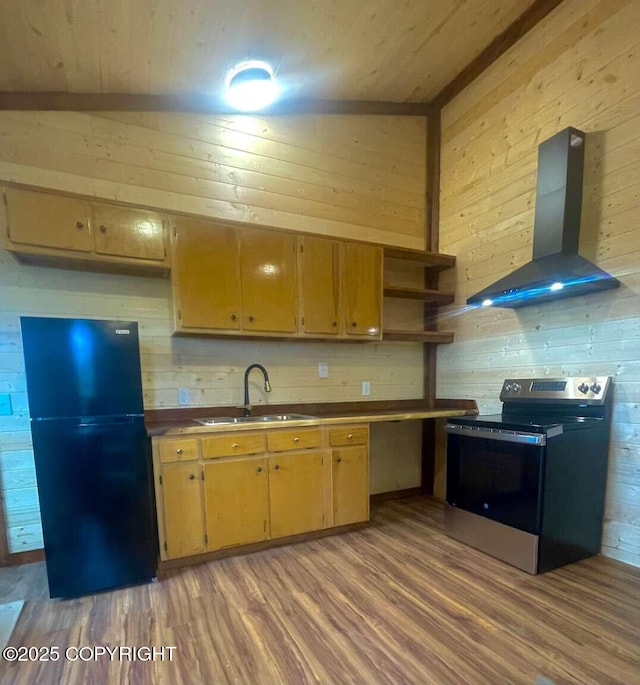 kitchen with a sink, electric stove, ventilation hood, freestanding refrigerator, and open shelves