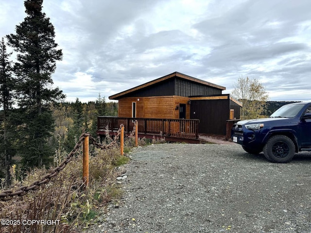 view of home's exterior featuring gravel driveway