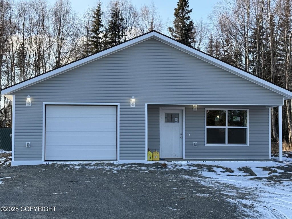 view of front of property featuring a garage