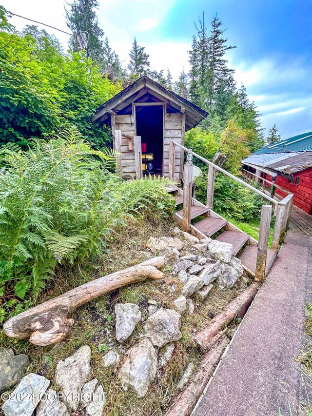 exterior space with an outbuilding