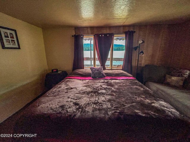 bedroom featuring a textured ceiling