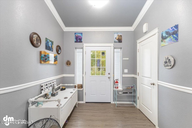 bathroom featuring crown molding and hardwood / wood-style flooring