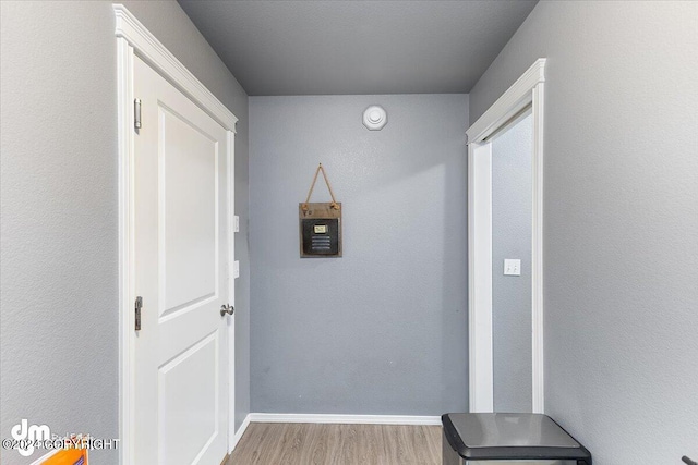 hall featuring light wood-type flooring