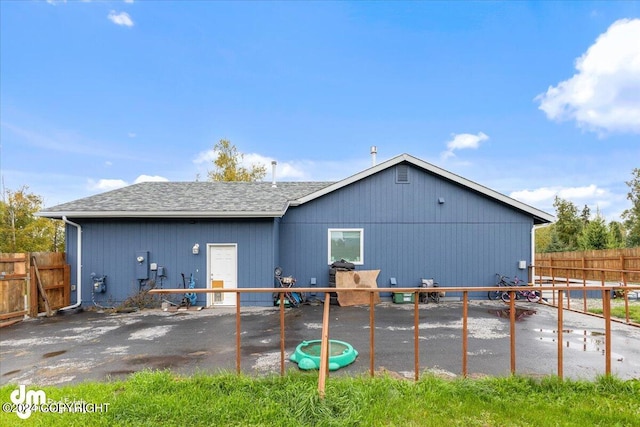 back of property with a patio area