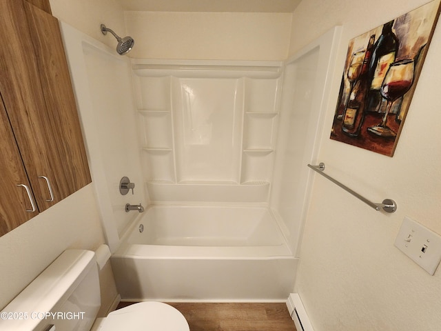 4342 Reka Dr, Anchorage, AK 99508 - bathroom with wood finished floors,  shower combination, and a baseboard heating unit