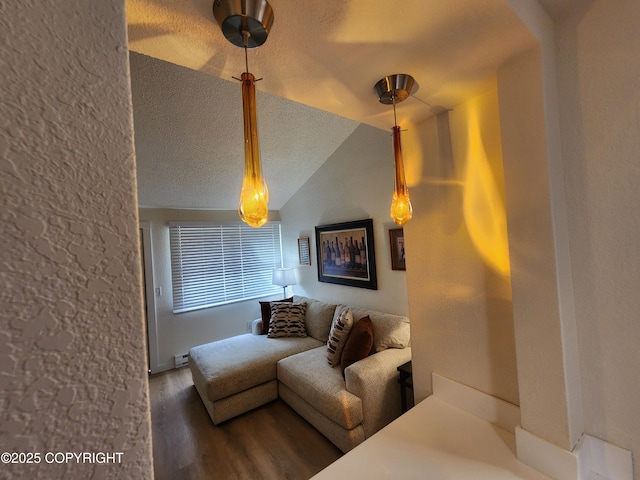 4342 Reka Dr, Anchorage, AK 99508 - living area with wood finished floors, a textured ceiling, and lofted ceiling