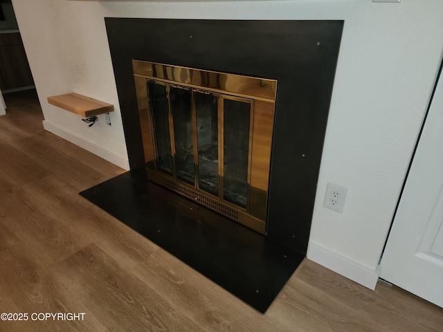 4342 Reka Dr, Anchorage, AK 99508 - detailed view of wood finished floors and baseboards