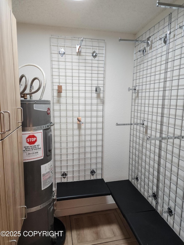 4342 Reka Dr, Anchorage, AK 99508 - bathroom featuring a tile shower and strapped water heater