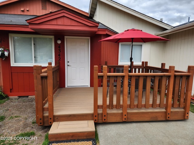 4342 Reka Dr, Anchorage, AK 99508 - view of exterior entry featuring a deck