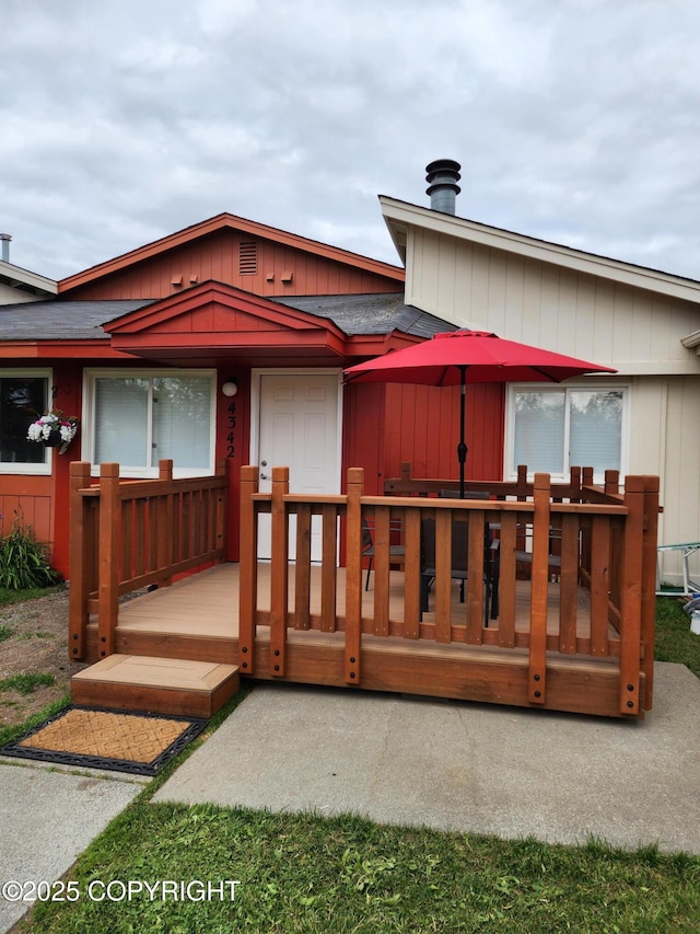 4342 Reka Dr, Anchorage, AK 99508 - rear view of property featuring a deck