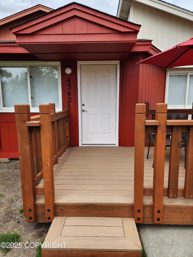 4342 Reka Dr, Anchorage, AK 99508 - view of exterior entry featuring a deck