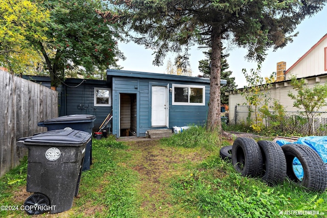 1324 Latouche St, Anchorage, AK 99501 - rear view of house with entry steps