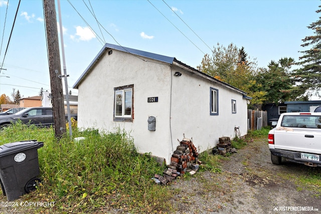 1324 Latouche St, Anchorage, AK 99501 - view of home's exterior with stucco siding