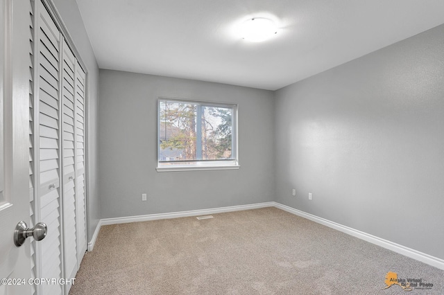 view of carpeted spare room