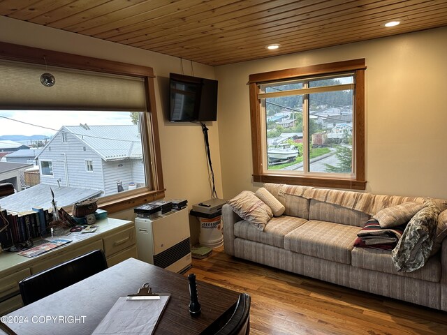 living room featuring wood finished floors, recessed lighting, and wood ceiling