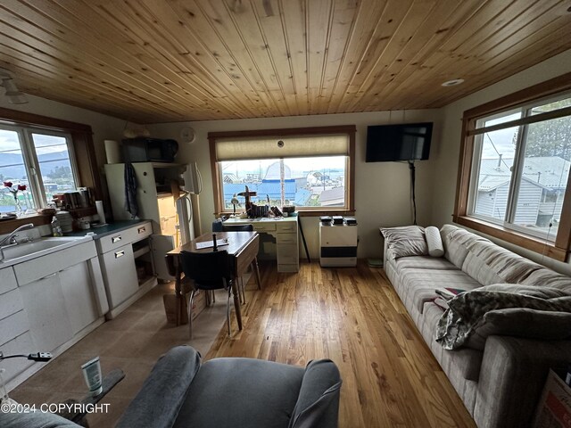 living room with wooden ceiling and light wood finished floors