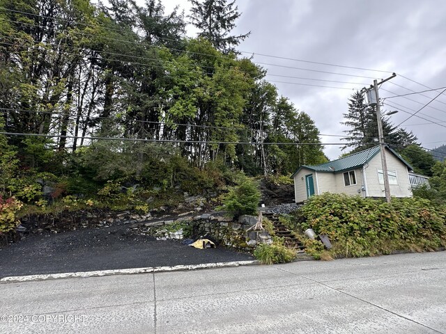 view of home's exterior featuring metal roof